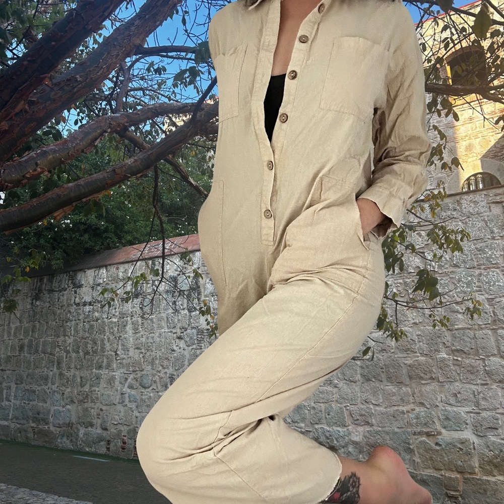 Cream linen jumpsuit with pockets